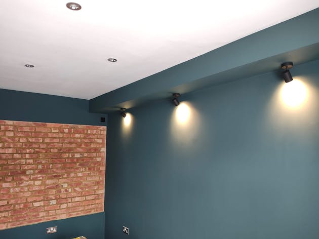 Spotlights and downlights in lounge, Portslade. May 2024.